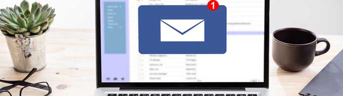 Email notification concept, one new inbox e mail, envelope with incoming message on computer laptop screen, business office desk background