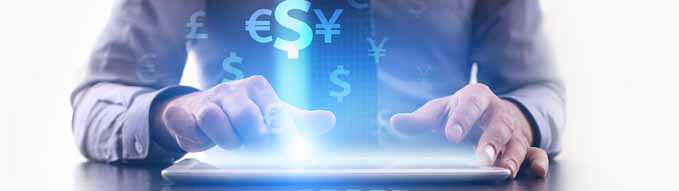 Forex trading concept. Businessman using futuristic tablet computer, pressing button on the touch screen and selecting icon dollar, euro, yen icons.