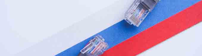 Internet and Russia. Internet cable on the background of the Russian flag. Internet shutdown. Cut cable. Internet access blocking.